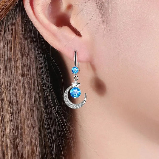 Luna Luxe: Sterling Silver Moon Earrings with White Sapphire Sparkle™