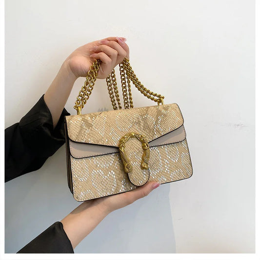 Women's Snake Print Crossbody Bag - Premium PU Leather with Chain Accent™
